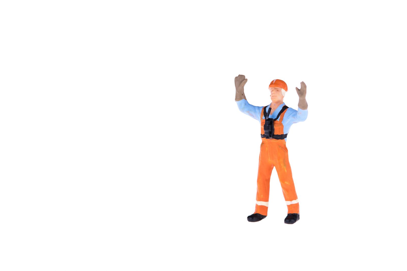 Miniatuurfiguur in beschermende werkkledij